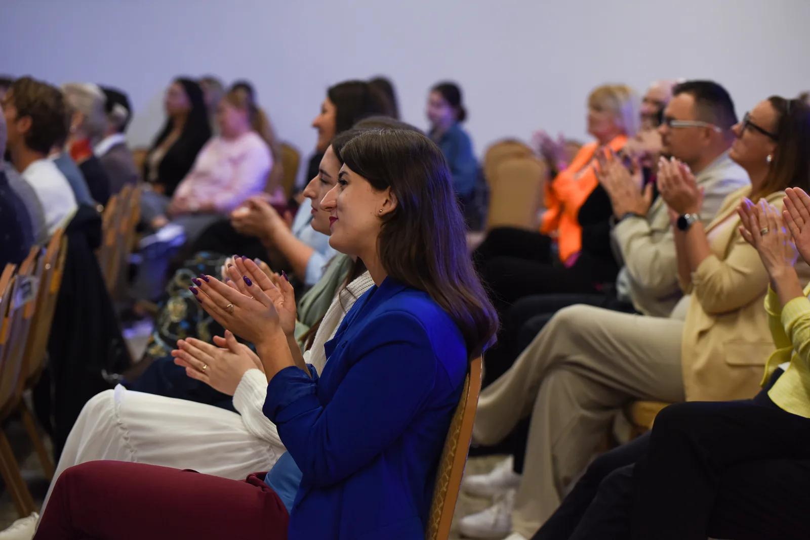People clapping joyfully at a Christian Centre Bratislava service